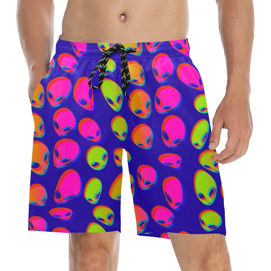 Neon alien blast swim shorts in purple with colorful alien faces, drawstring waist