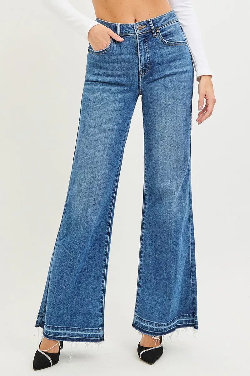 High-rise wide-leg jeans in medium wash, button-and-zip front