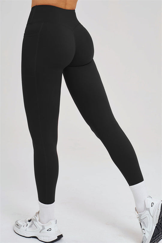 Black leggings with white sock cuffs, full-length fit and contoured seams