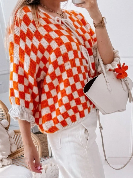 Orange and white checkered tie-front knit cardigan, ruffled cuffs and drawstring front ties