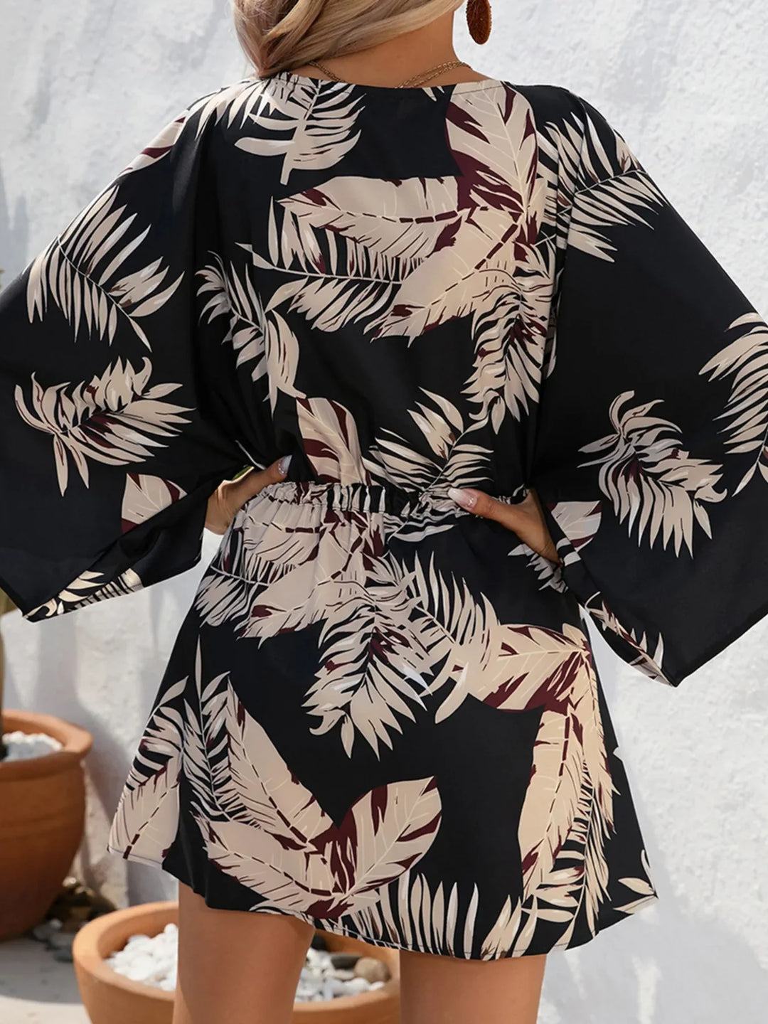 Black leaf-print button-up dress with gathered drawstring waist and wide sleeves
