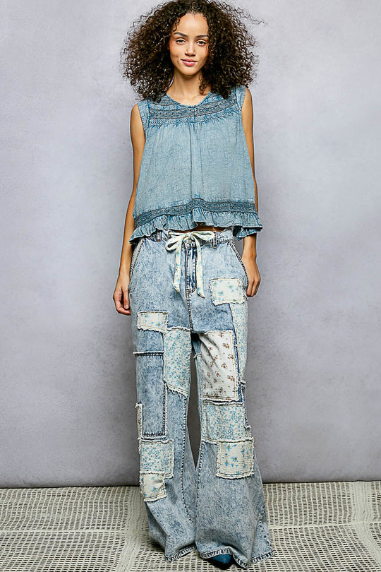 Shopimist denim blue sleeveless cotton blouse with ruffled hem and embroidered yoke