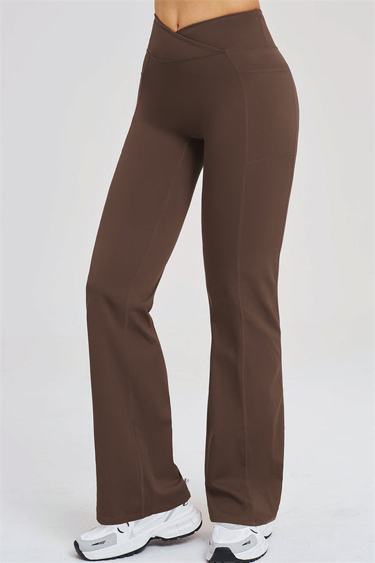 Taupe flared leggings from back with high waist and center seam