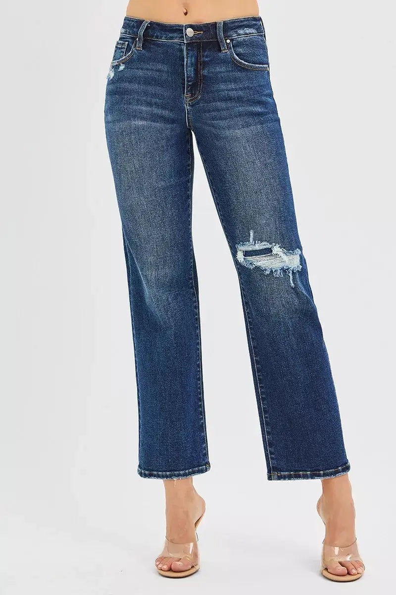 Dark blue high-rise crop slim straight jeans, light distress at knee and hem
