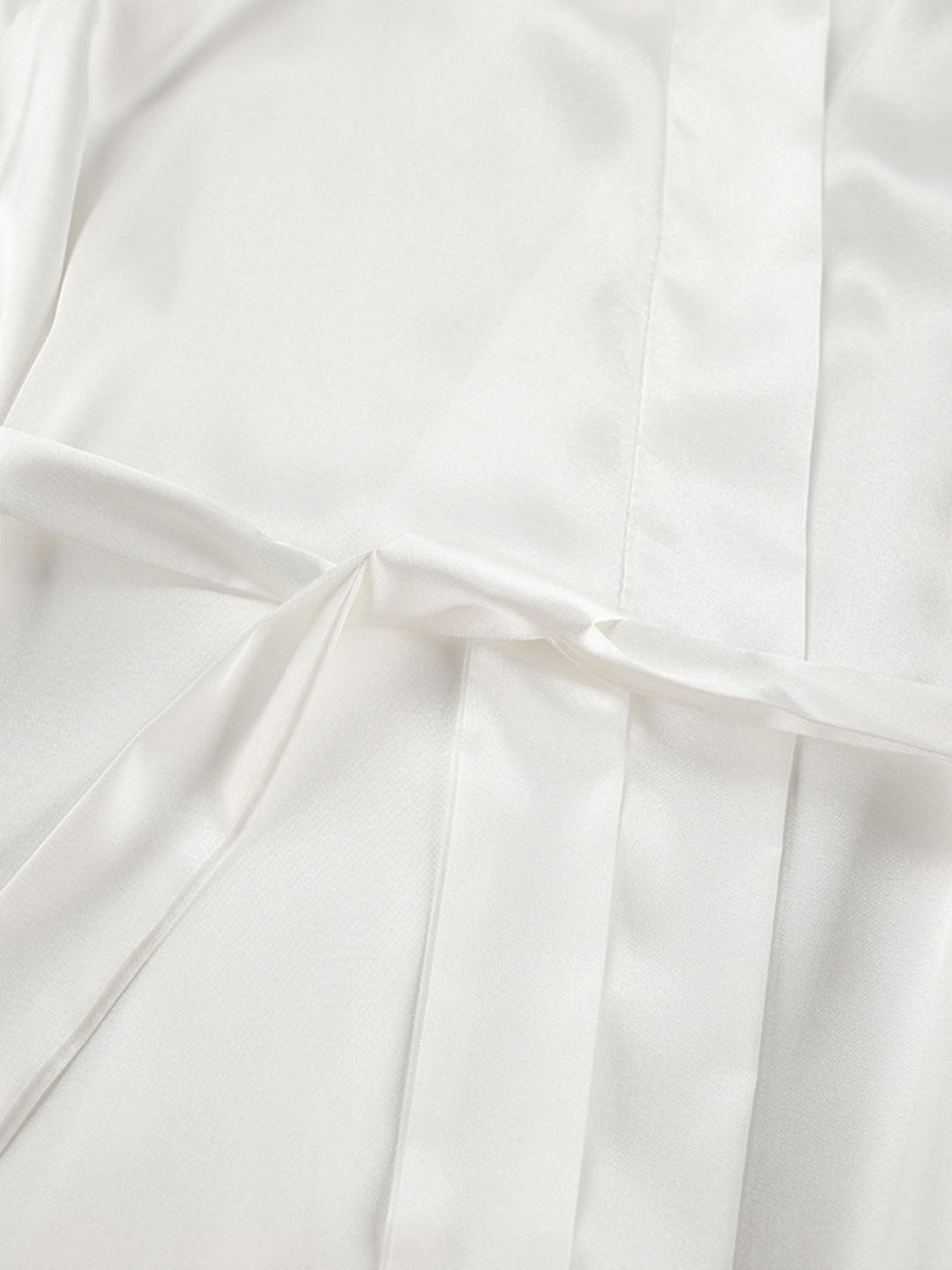 White lounge set fabric with pleated drape detail