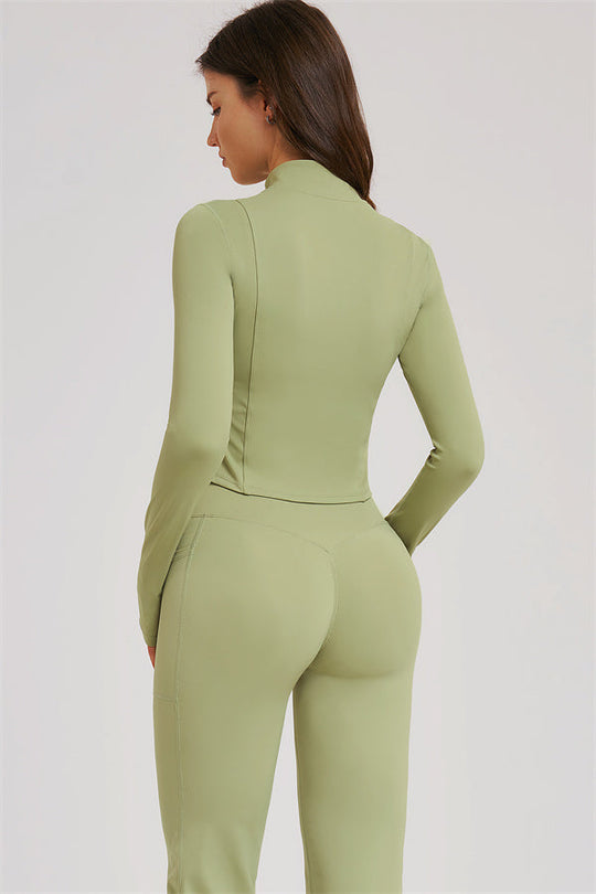 Olive green zip-back jacket and flared leggings set, side view