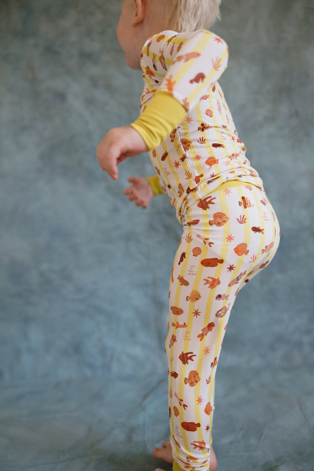 Fancy Fins two-piece set: long-sleeve top and matching pants with animal print