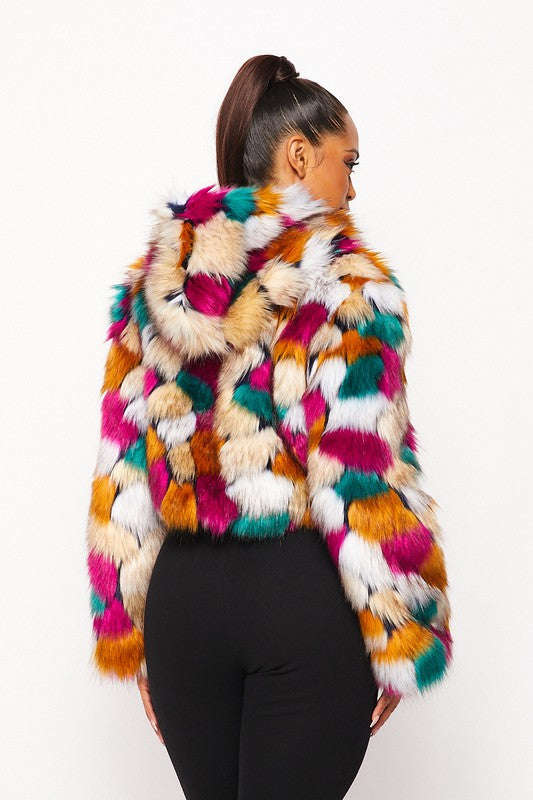 Multicolor faux fur hooded jacket, back view showing colorful fur blocks and hood