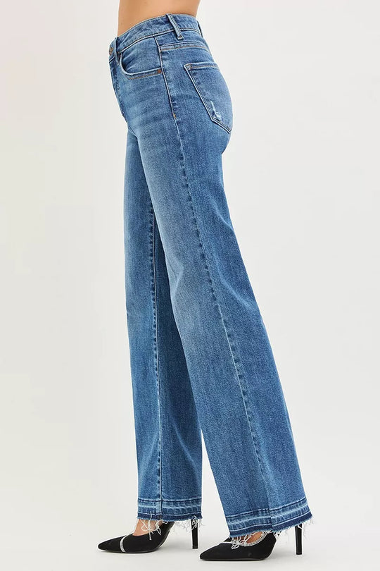 Back view: medium wash wide-leg jeans with two back pockets
