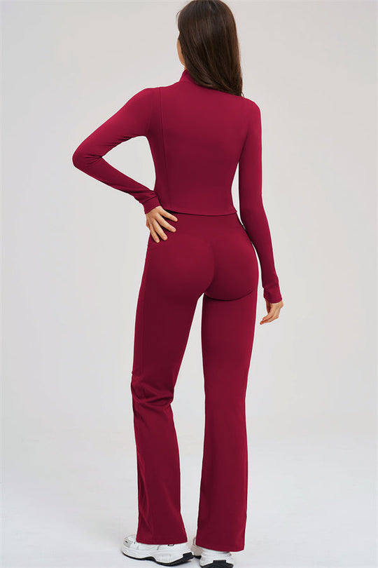 Burgundy activewear set: zip jacket and flared leggings, back view