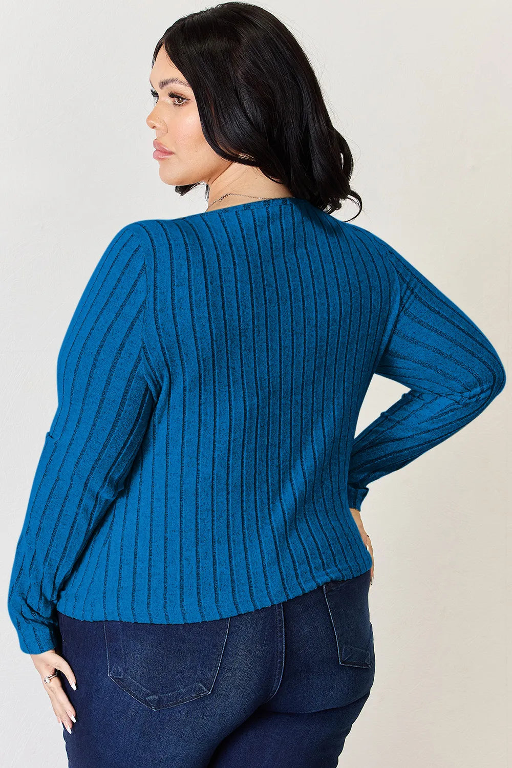 Sky blue ribbed long-sleeve T-shirt shown from back, long sleeves with cuff