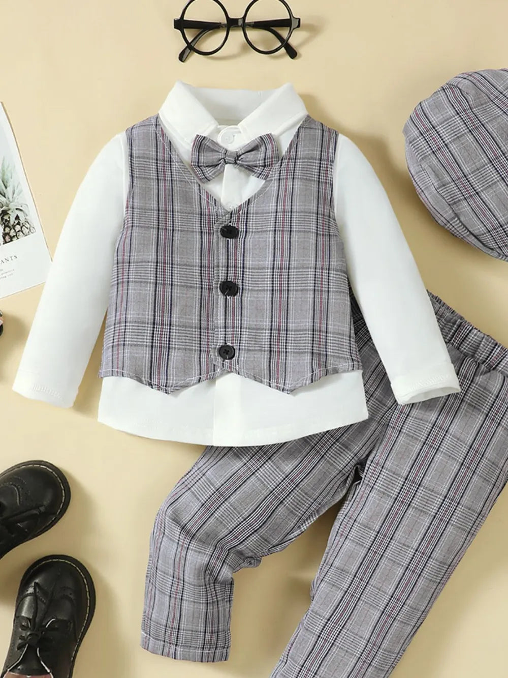 Gray plaid waistcoat with bow tie over white long-sleeve shirt and plaid trousers