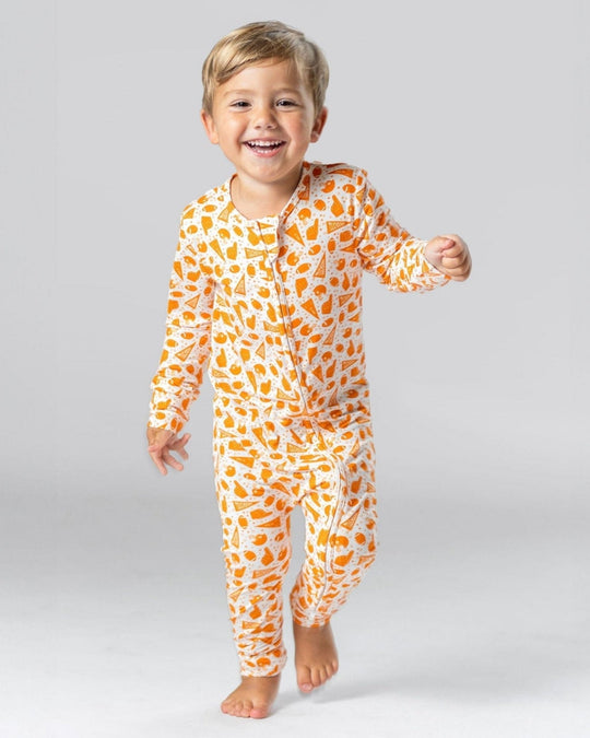 Toddler bamboo pajama set with orange-and-white football print, front zip