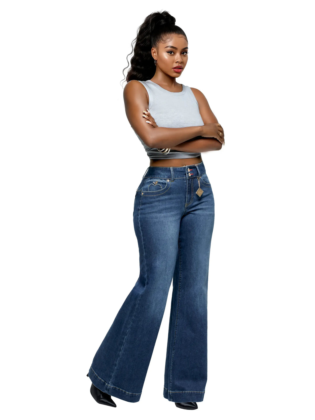 Wide-leg jeans, medium-dark blue wash, high waist with belt loops and front gold buttons