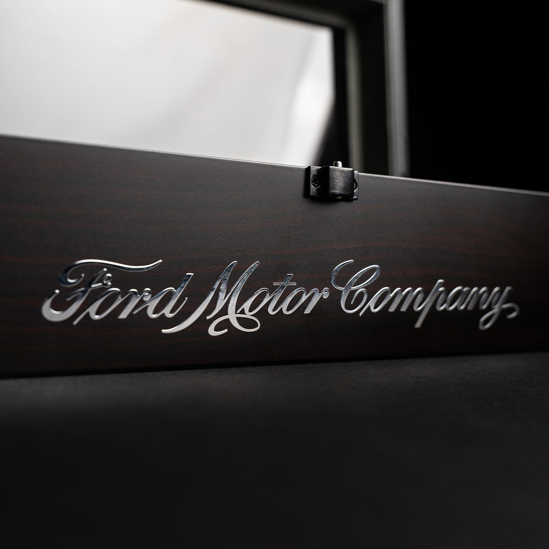 Ebony watch holder lid with engraved Ford Motor Company logo