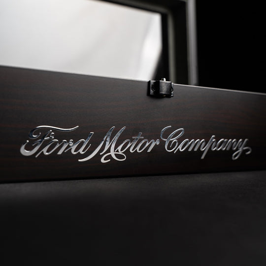 Ebony watch holder lid with engraved Ford Motor Company logo