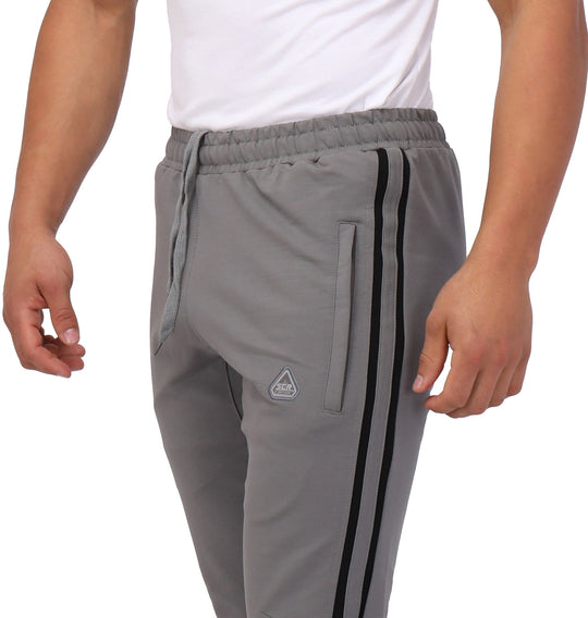 Platinum grey joggers: zip pocket, logo patch, and black side stripe