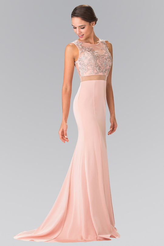 Dusty Rose prom dress featuring illusion waistline and ornate beaded lace top