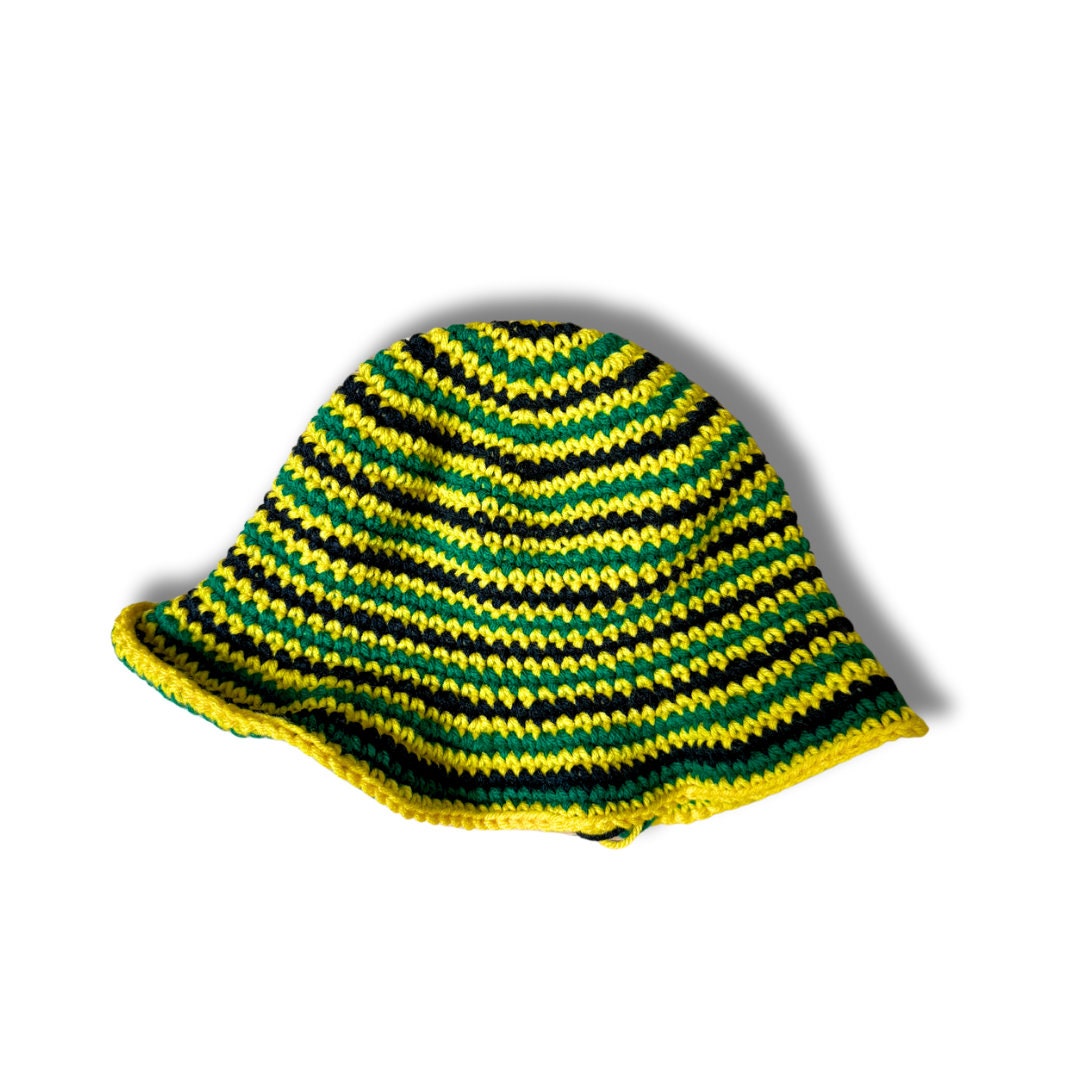 Crochet Bucket Hat in black, green, and yellow striped yarn