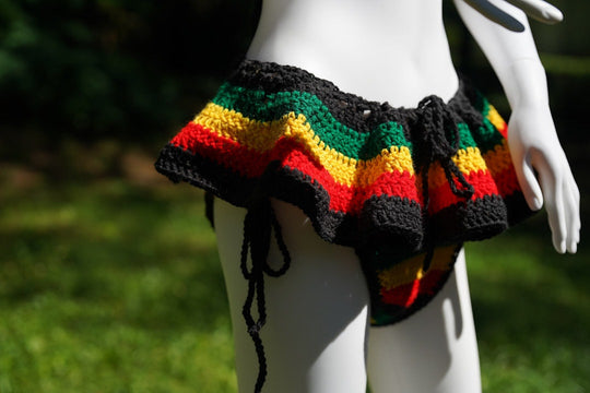 Micro mini skirt in crochet with black base and red, yellow, green rainbow stripes