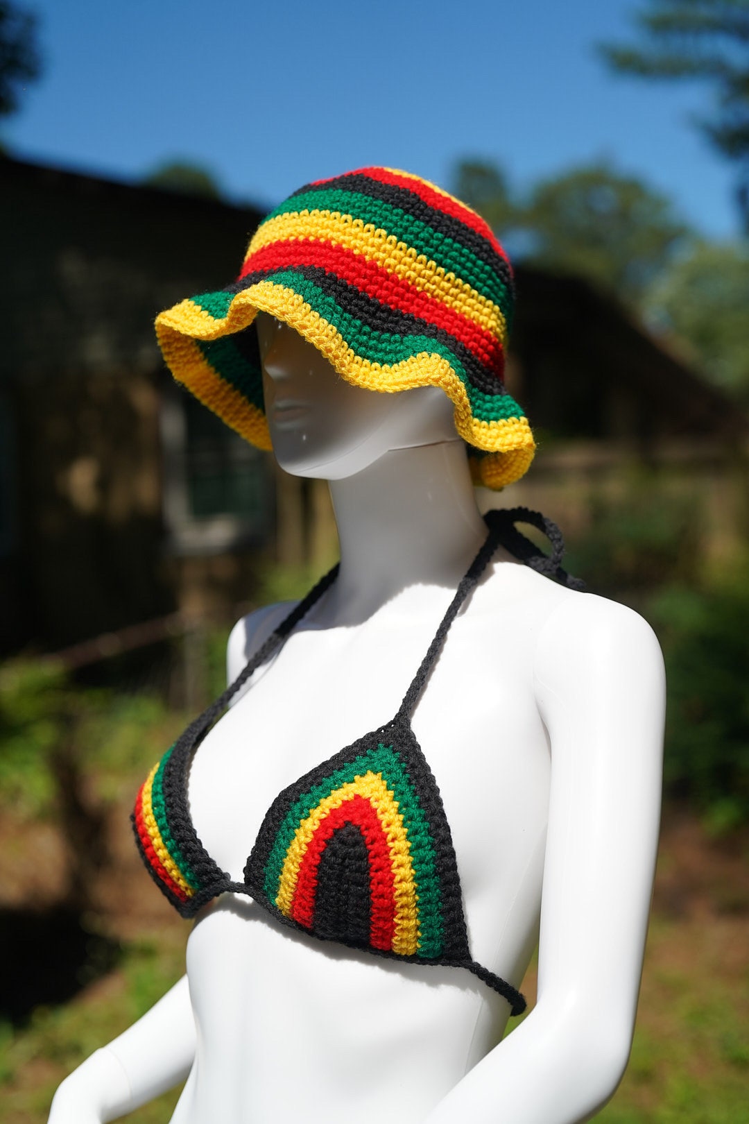 Crochet bucket hat with rasta stripes and matching black triangle bikini top