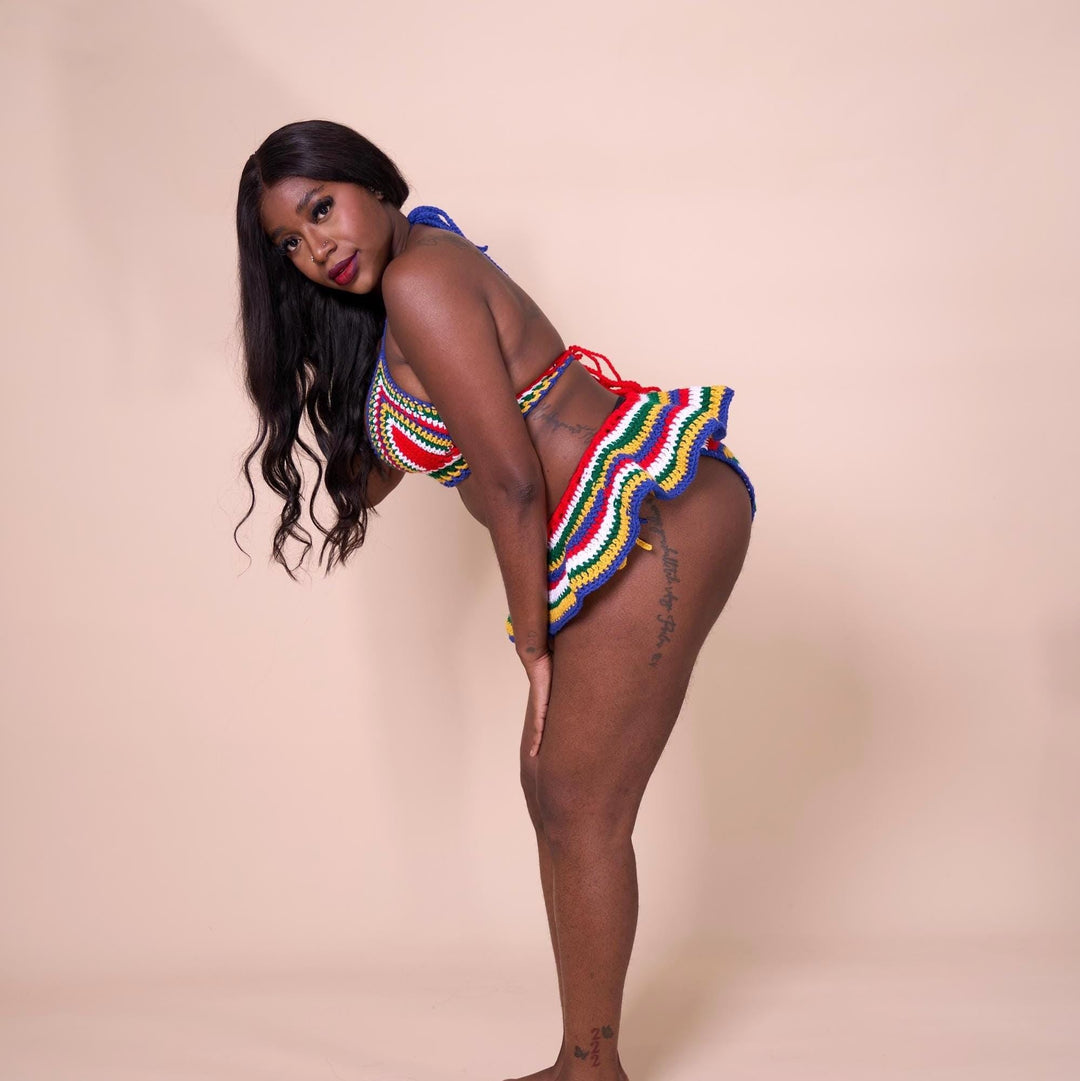 Back view of multicolor striped crochet bikini with micro mini skirt cover-up