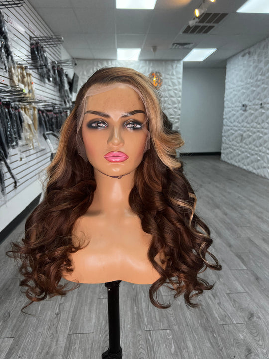 BRI WAVY UNIT wig, long dark-brown wavy hair with subtle blonde highlights near crown