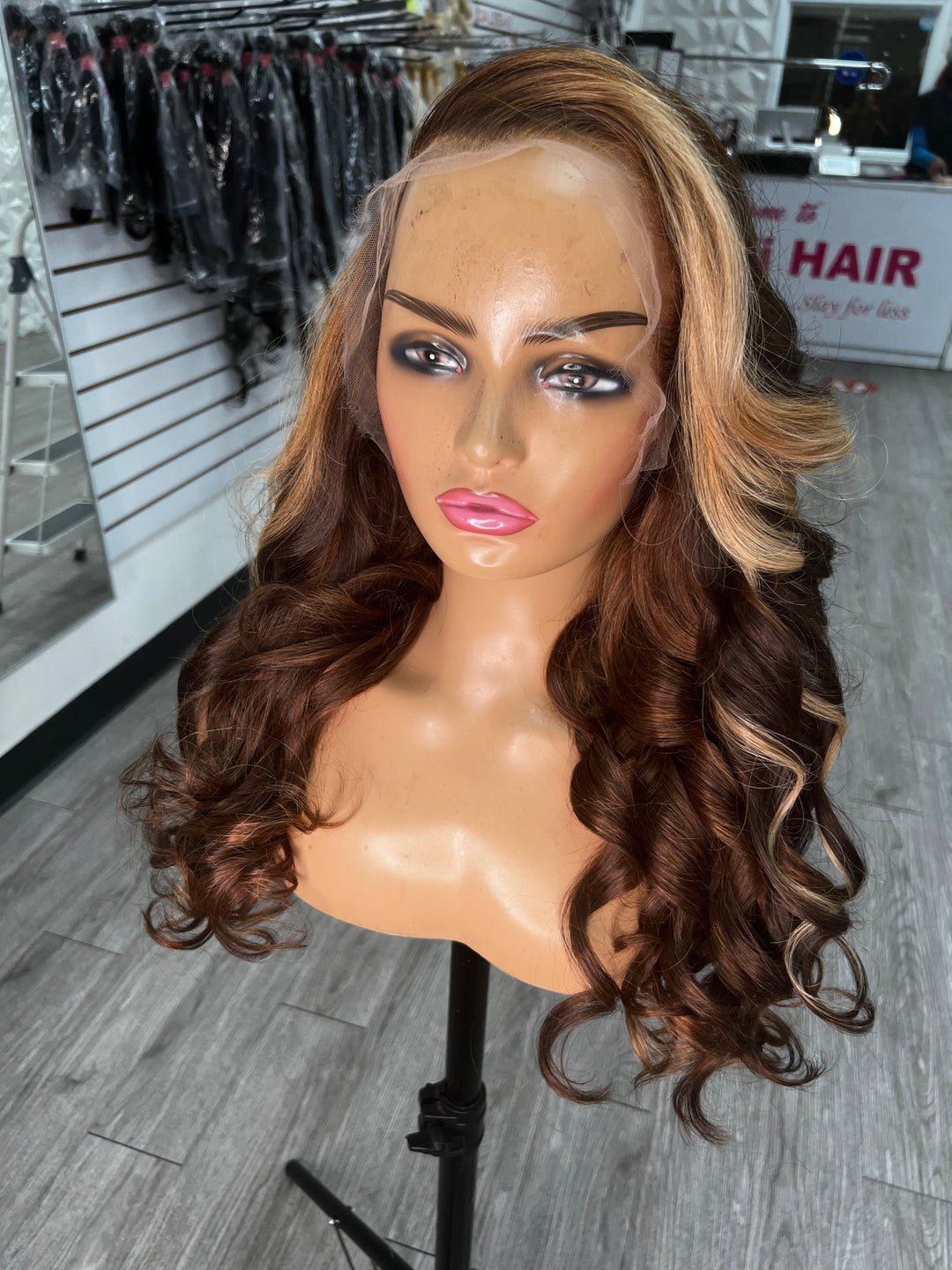 BRI WAVY UNIT wig, shoulder-length dark brown curls with face-framing blonde highlights
