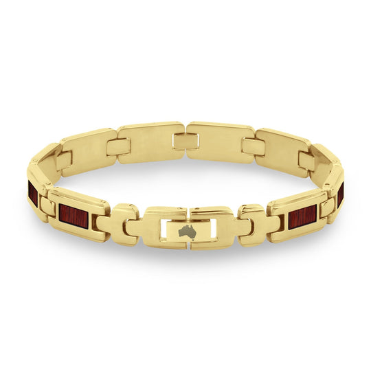 Gelbgoldfarbenes Link-Armband mit roten Einsätzen und zentralem Schließelement