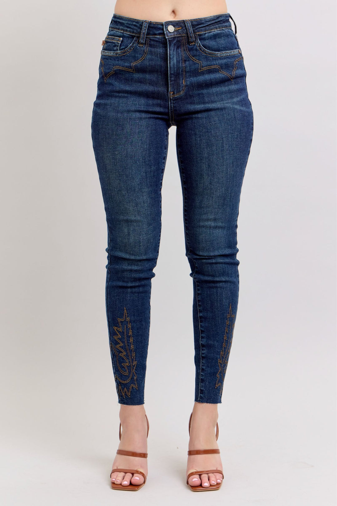 Dunkelblaue High-Rise Skinny-Jeans mit Stickerei am Beinabschluss
