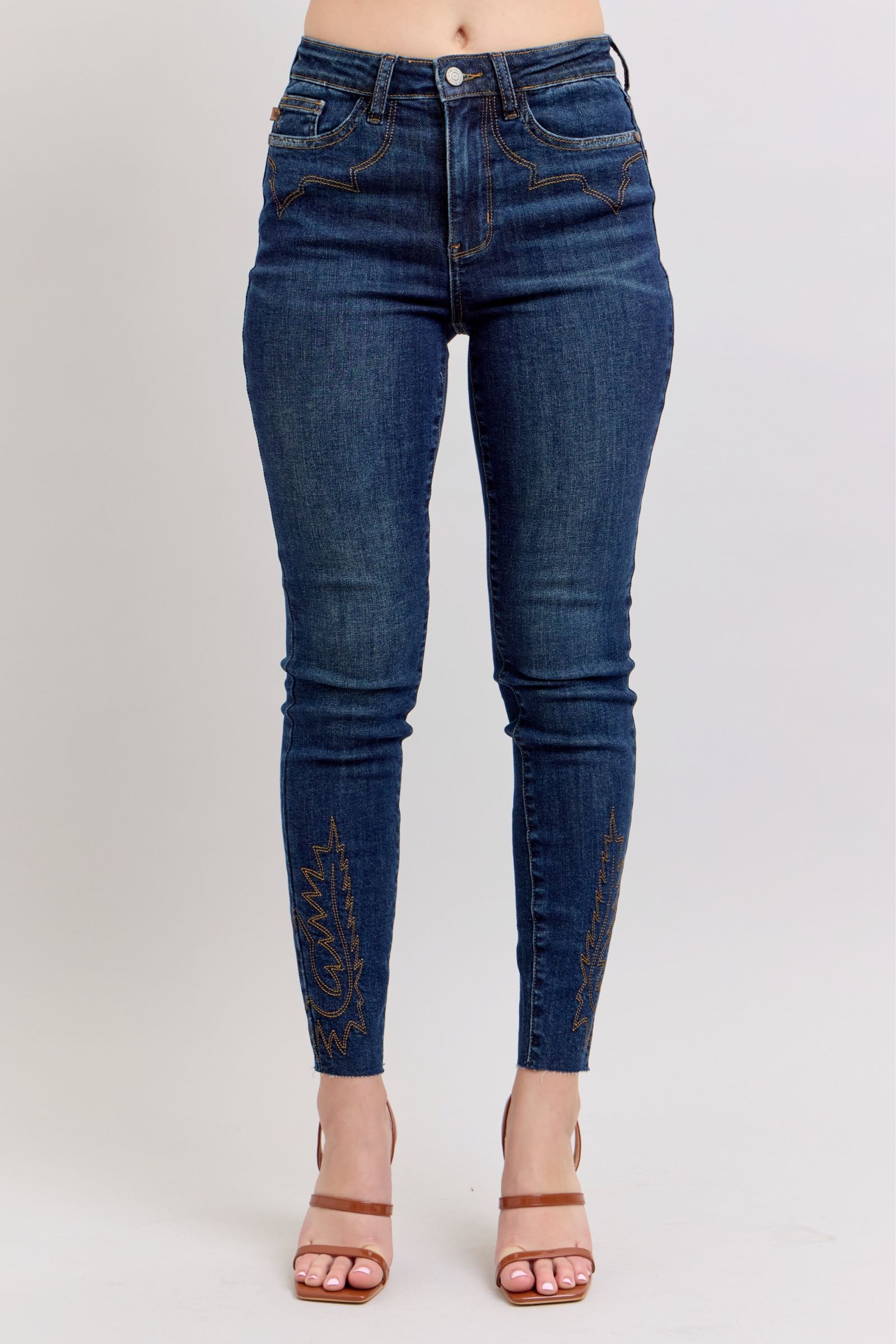 Dunkelblaue High-Rise Skinny-Jeans mit Stickerei am Beinabschluss