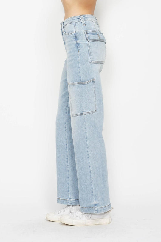 Back view of light wash high-waist straight cargo jeans with patch cargo pockets