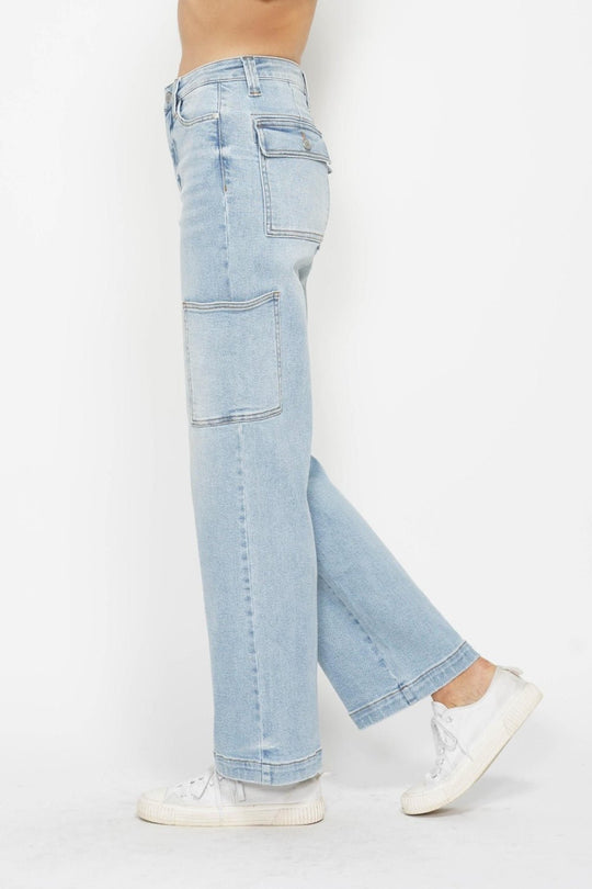 Light wash high-waist straight cargo jeans shown from the side with cargo pocket detail