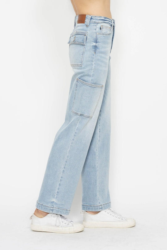 Light wash high-waist straight cargo jeans front-side view with stacked cargo pockets