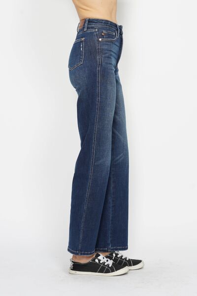 Dark high-waist denim jeans with back yoke, belt loops, and straight leg