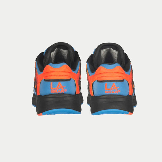 Kids black lowtop heel view with blue collar trim, orange heel panel, and LA Gear logo