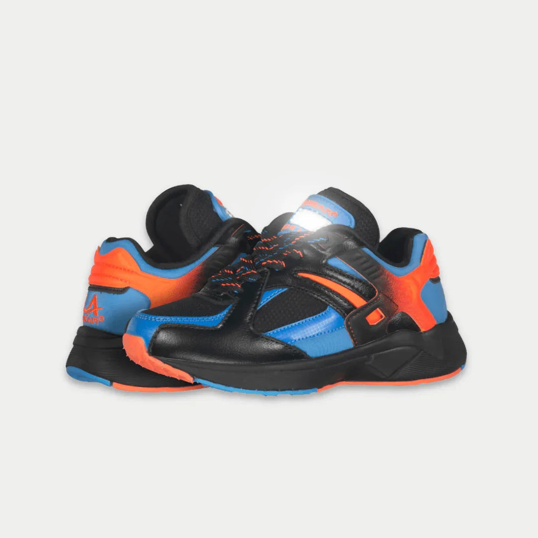 Angled view of kids black lowtop sneakers with blue accents, orange side panels, and laces