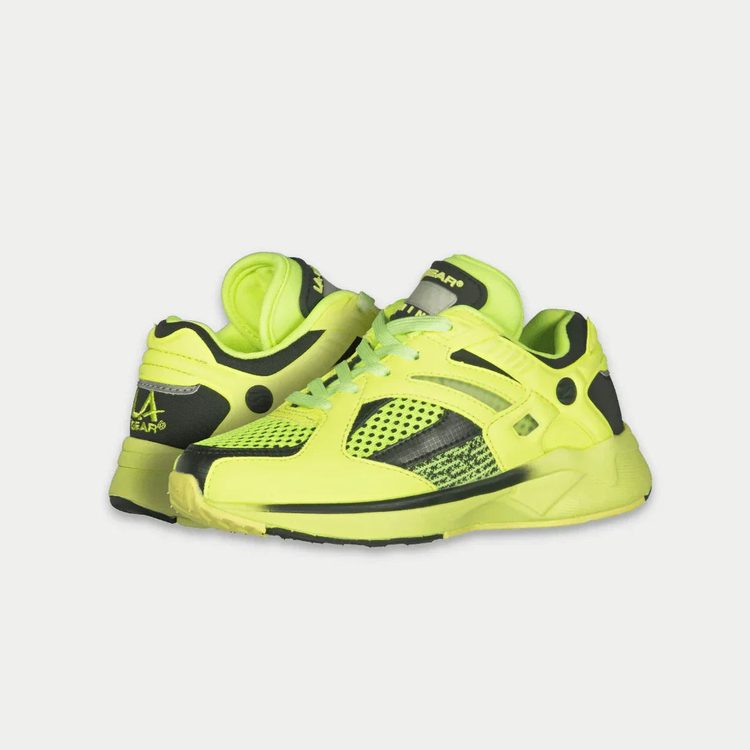LA Gear kids lowtop sneakers, neon yellow uppers with black accents and perforated panels