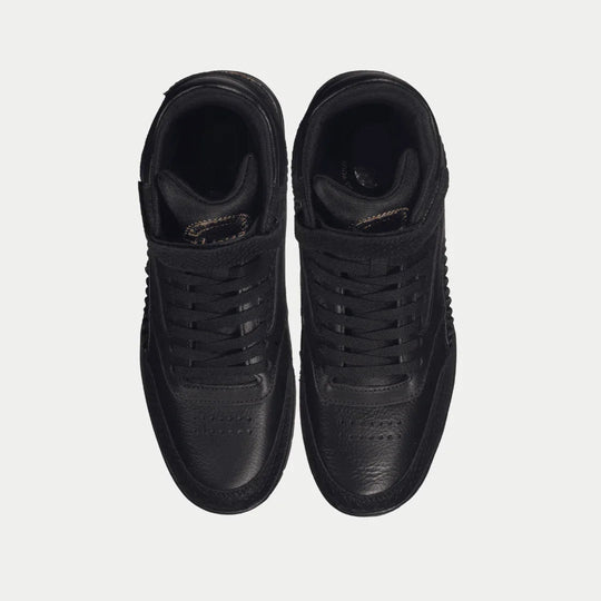 Black high-top sneakers front view, lace-up closure and padded collar