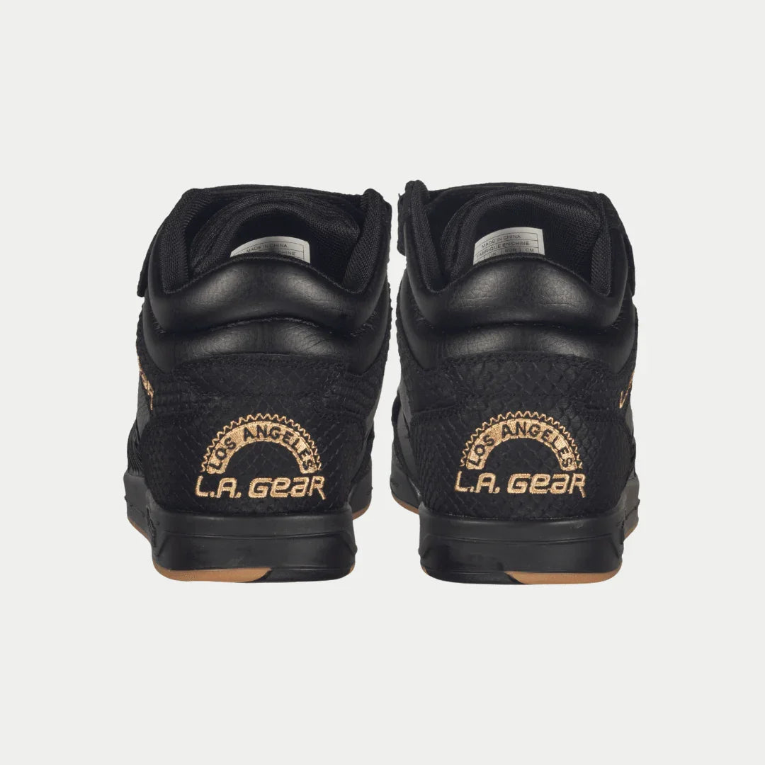 Black high-top sneakers back view with heel flame patch and gum sole