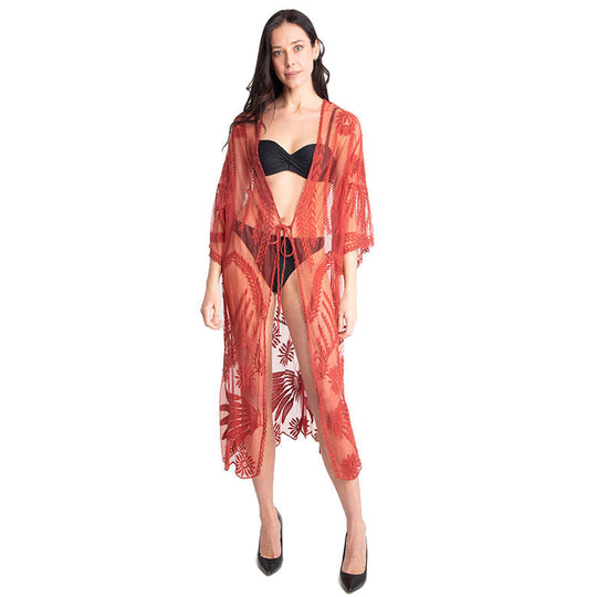 Red lace kimono poncho with tie-knot closure, open front with leaf-and-floral print