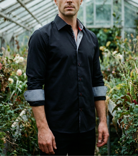 Black knit-stretch button-up shirt, tailored fit; contrast collar and cuff lining.