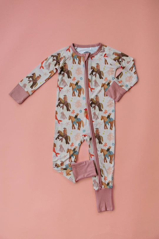 Mermaid zipper romper with long sleeves, all-over animal print, and pink cuffs
