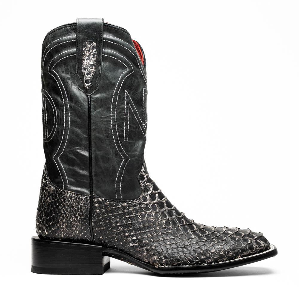 Black western boot with high shaft, V-shaped stitched panels, and red inner lining
