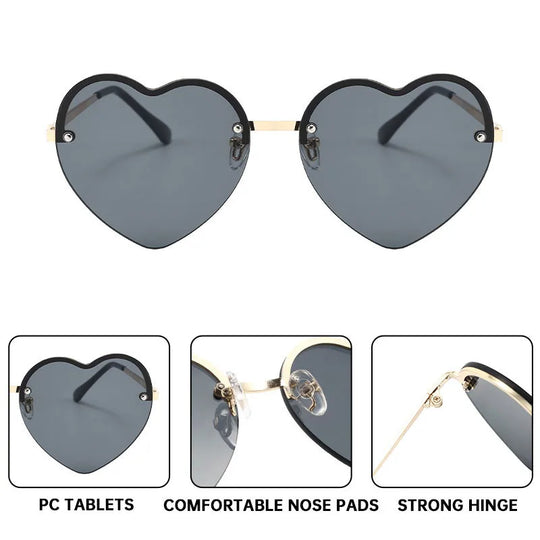 Heart-shaped half-rim sunglasses with dark gray lenses and black frame