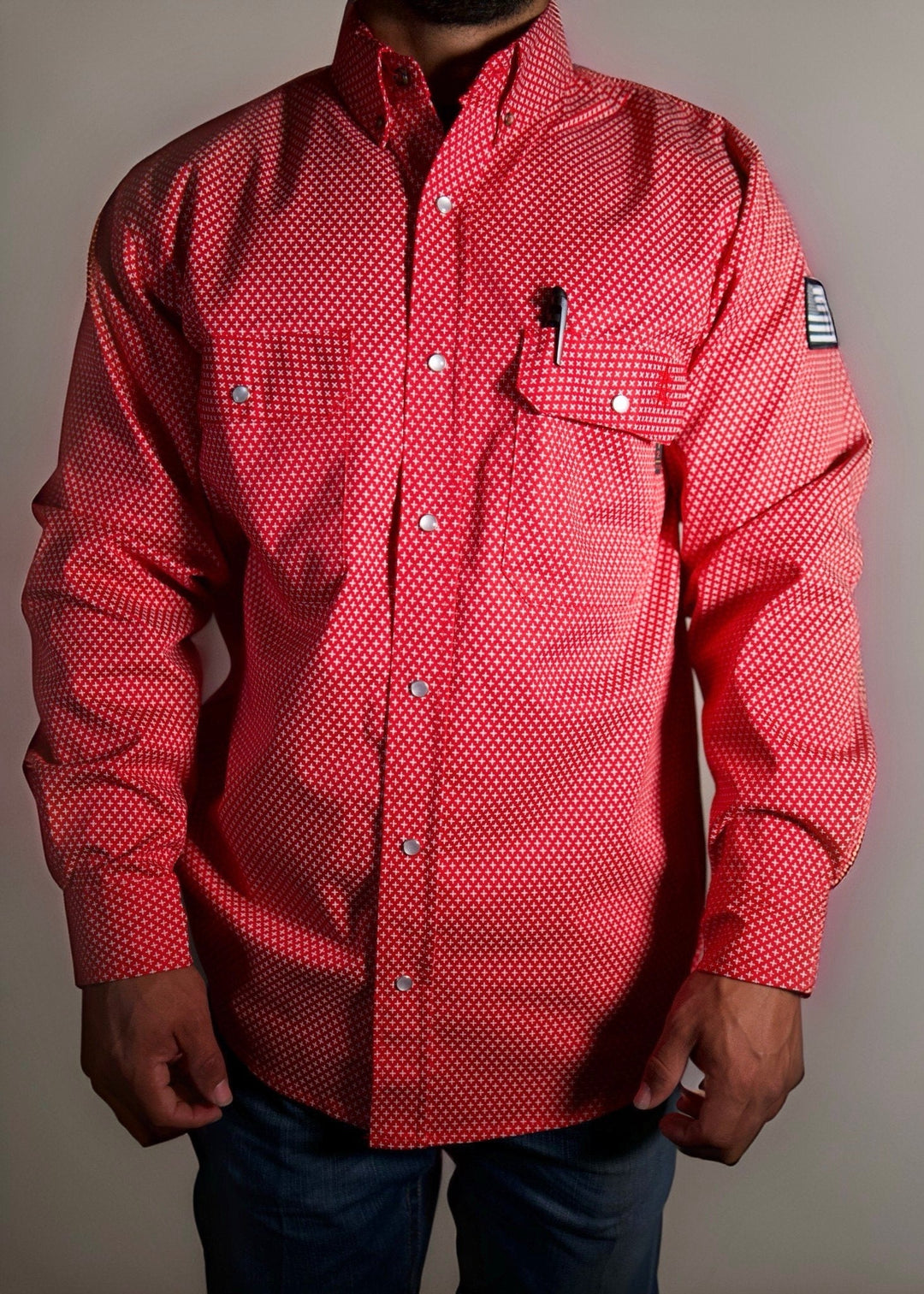Pearl snap work shirt with long sleeves, chest pocket with tag detail, red patterned