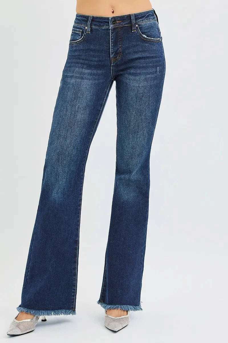 Dark wash flare jeans, mid-rise waistband, classic 5-pocket styling, frayed cuffs