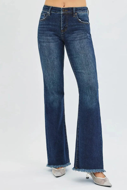 Dark wash flare jeans, mid rise, belt loops, button closure, frayed hem