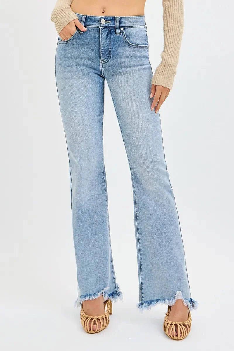 Medium wash flare jeans with frayed cuffs and button-fly front