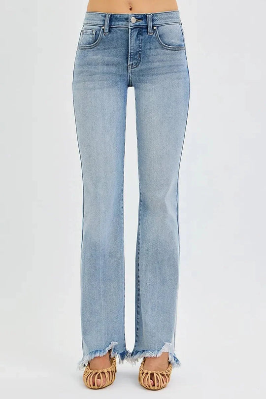 Medium wash flare jeans with button-fly front and frayed hem
